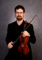 Jordan and Priscella with violin's